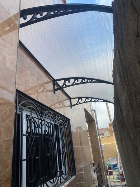 Auvent mural polycarbonate