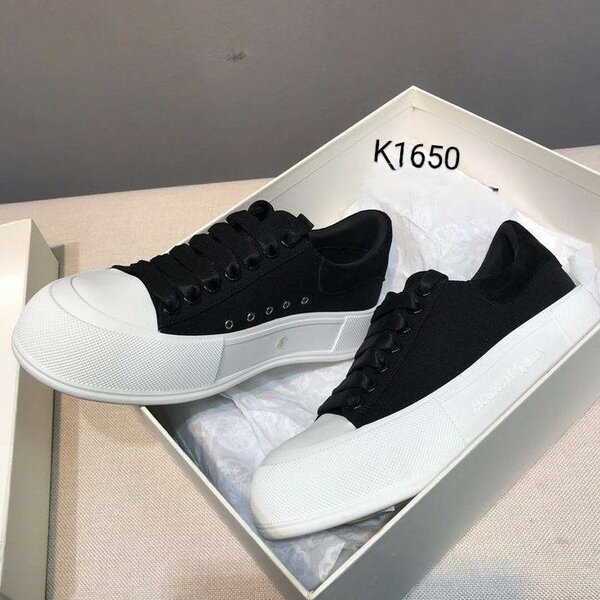 Stylish Black Sneakers with White Sole