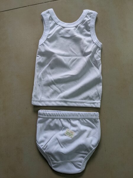 Wear or baby vest top and dawn..