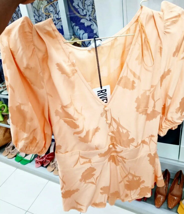 Beige blouse with print