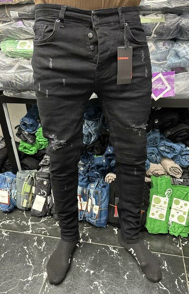 Jeans noirs slim déchirés