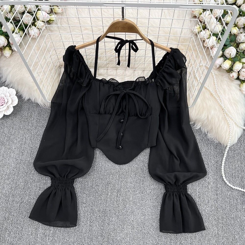 Top court à manches bouffantes