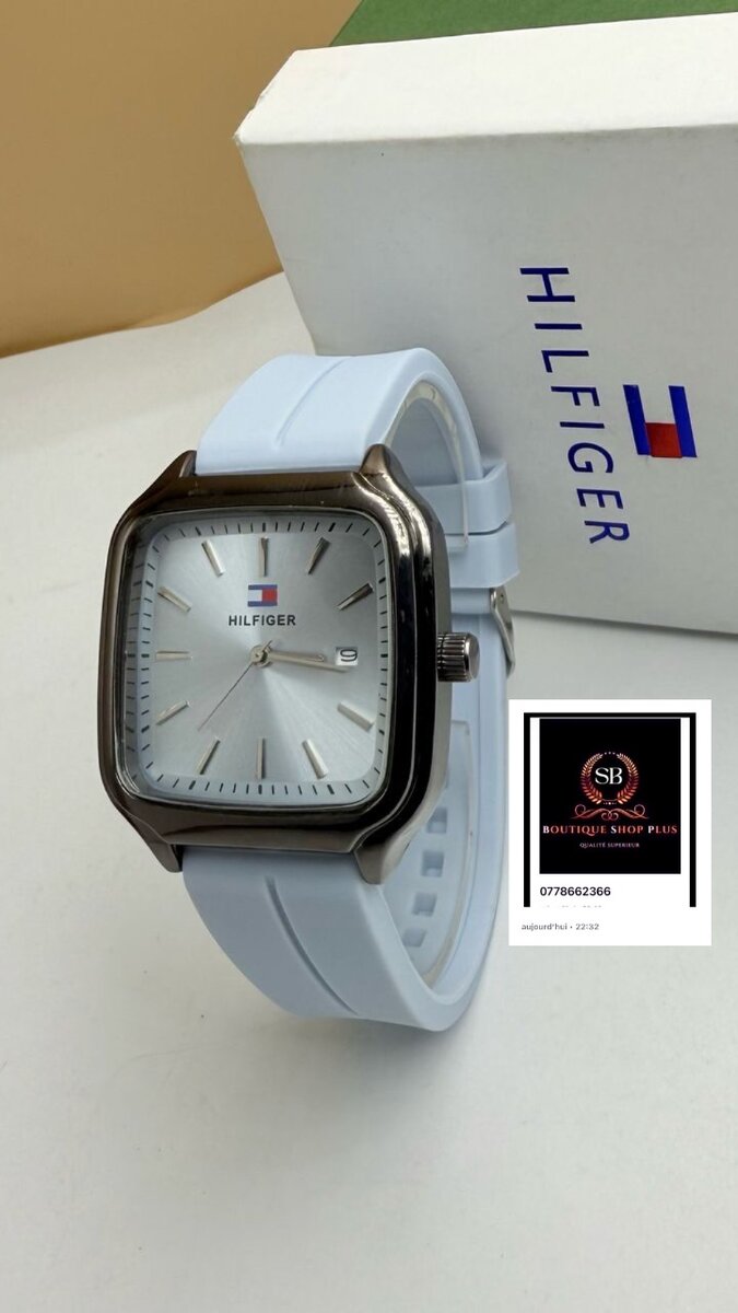 Montre tommy avec sa boîte