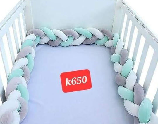 blue bed with a sideboard