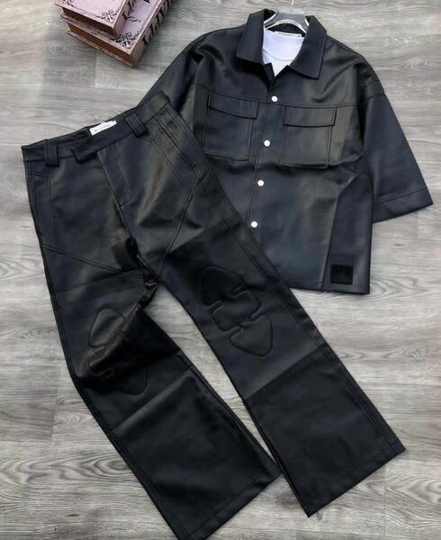 leather button-down shirt and wide-leg leather pants