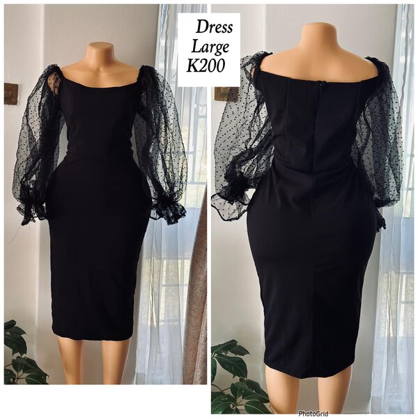 Black dress with transparent sleeves in size L