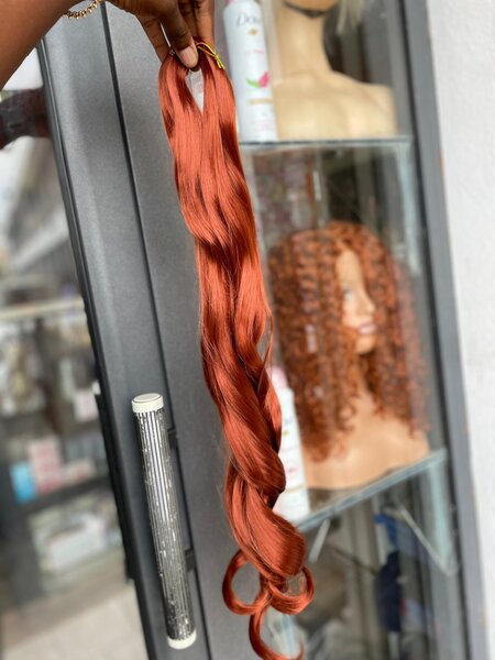 Tissage cheveux roux ondulés
