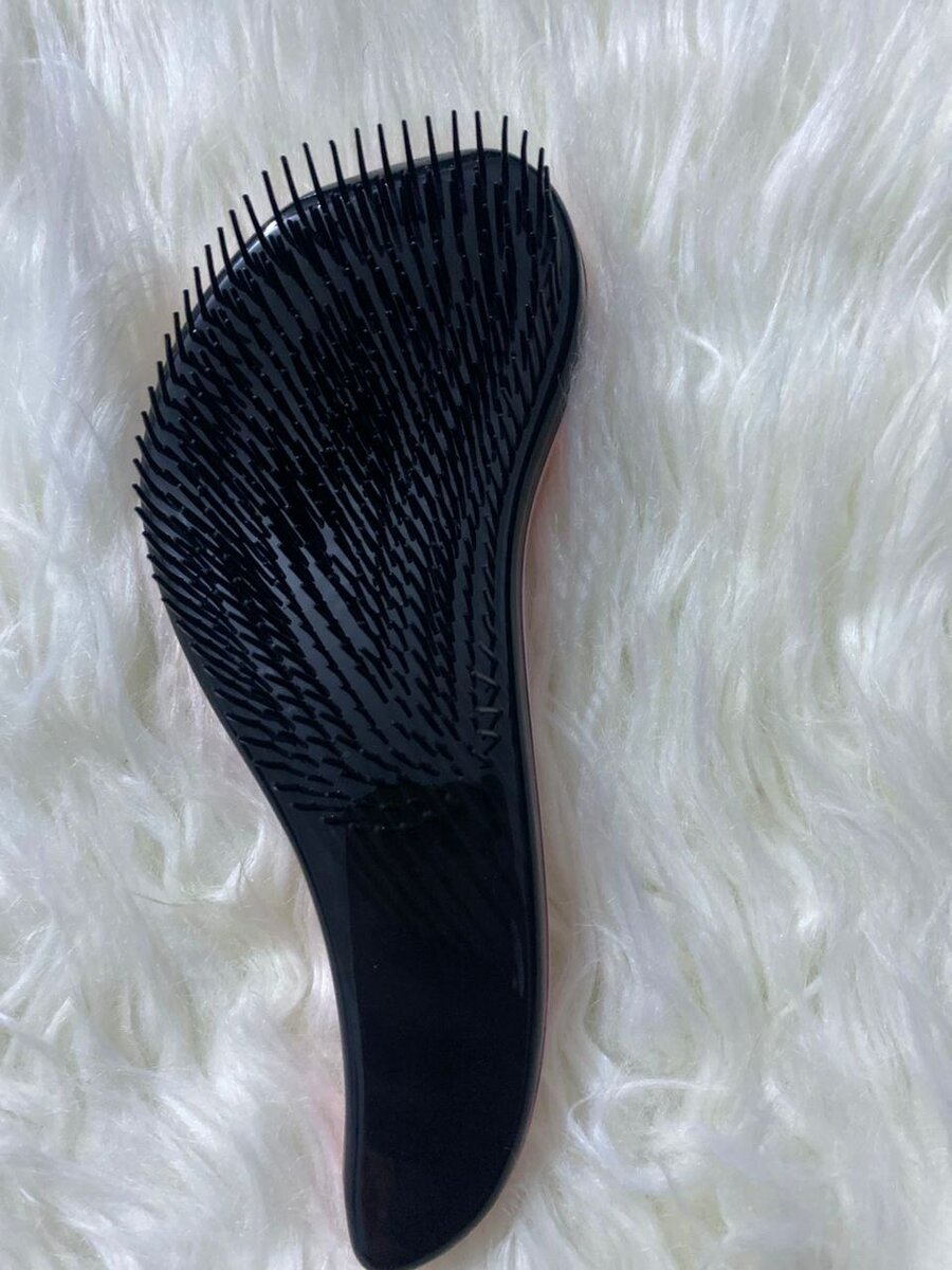 Brosse démêlante ergonomique