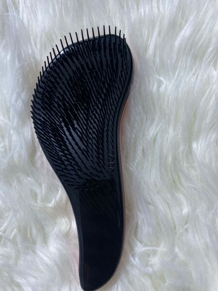 Brosse démêlante ergonomique