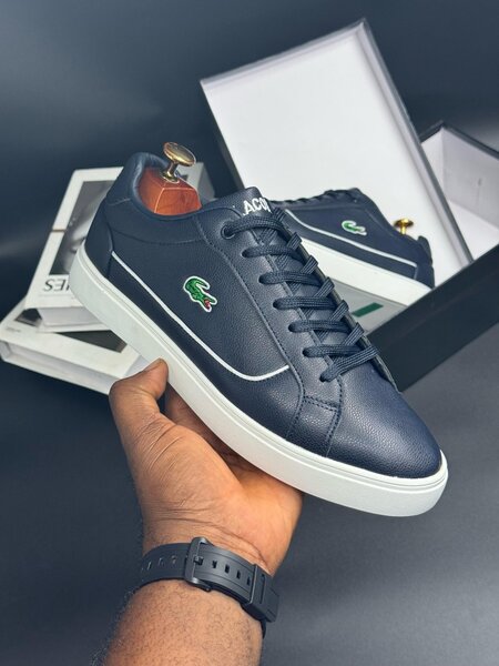 LACOSTE NAVY AND WHITE