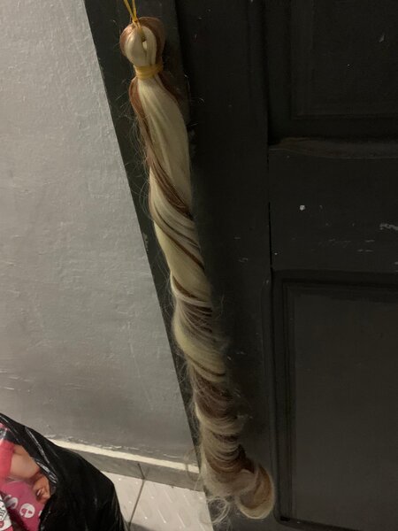 Extensions cheveux bouclés blond