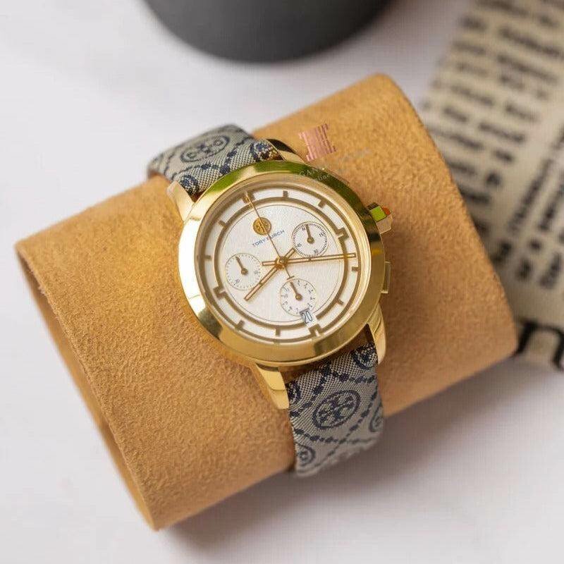 Montre élégante dorée femme