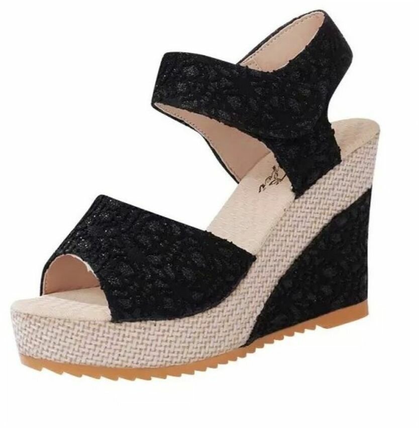 Sandales compensées noires élégantes