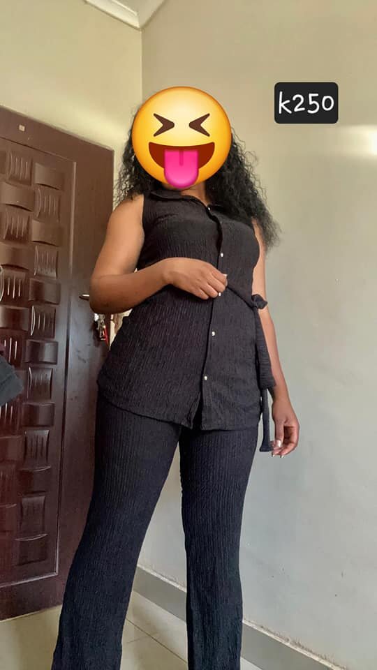 Women's black suit, top and trousers