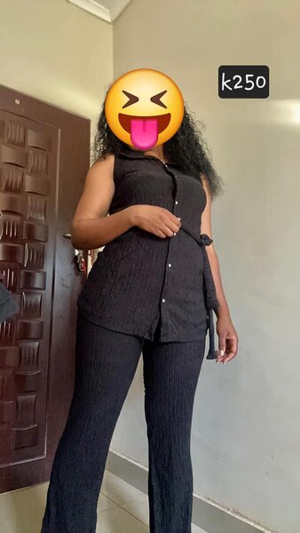 Women's black suit, top and trousers