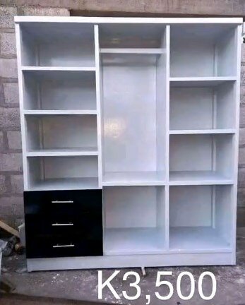 White wardrobe with black drawers