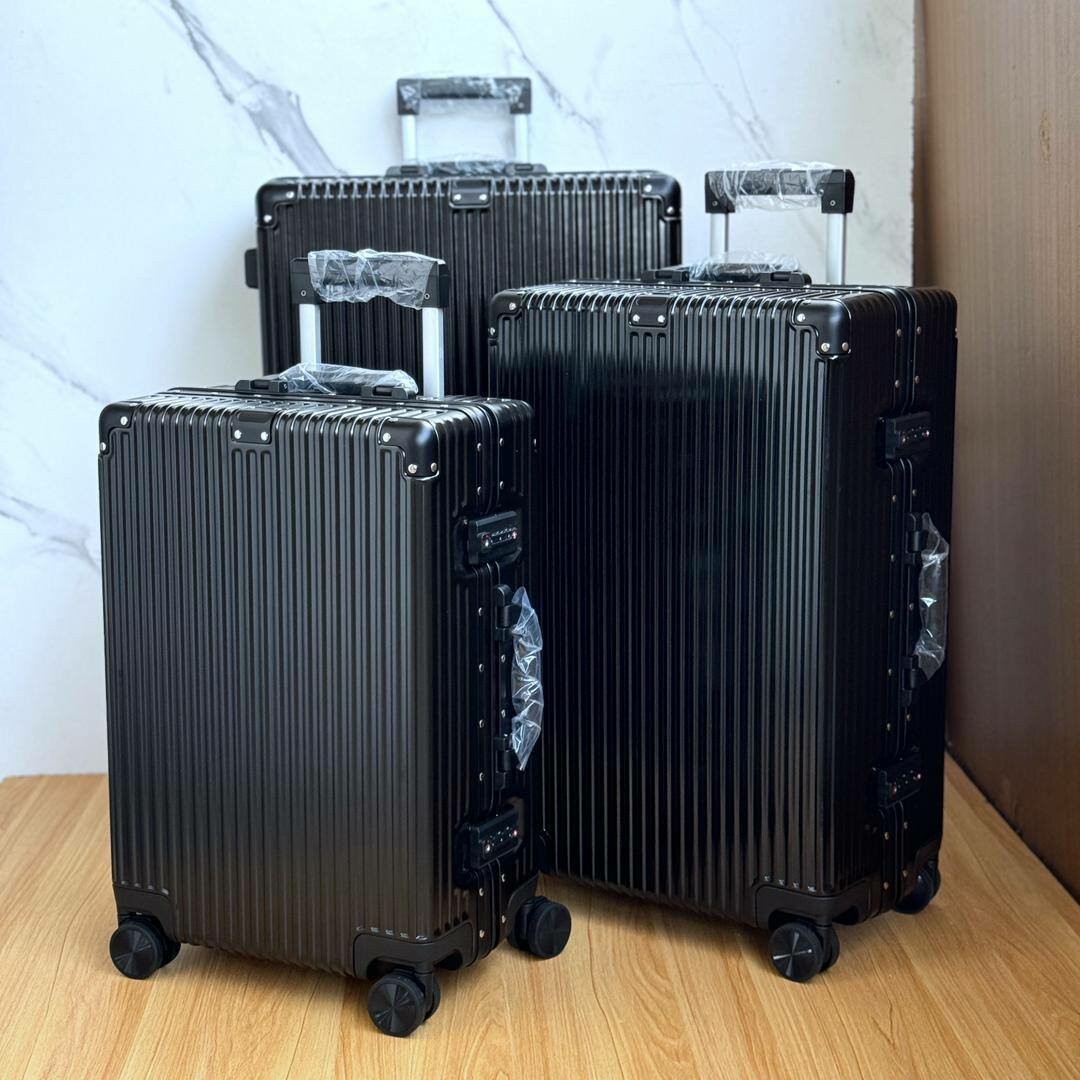 LUXURY STAINLESS SUITCASE  AND TRAVELING BAGS