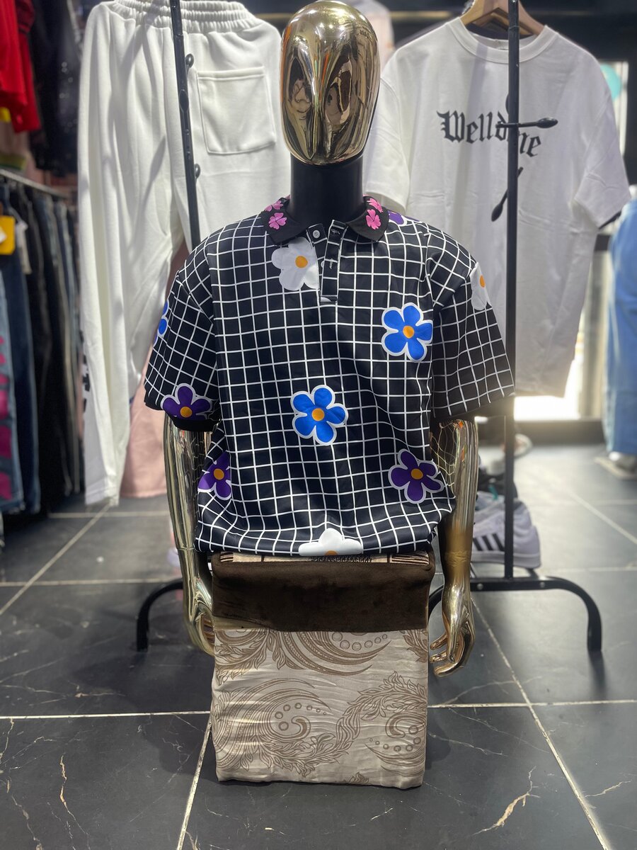 Polo chemise à motifs floraux