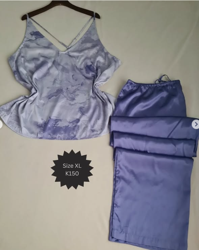 T-shirt and blue trousers