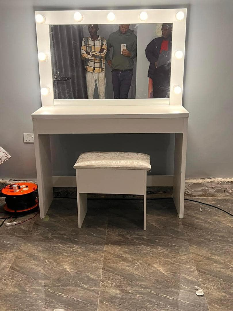 beige makeup table with mirror without cabinets