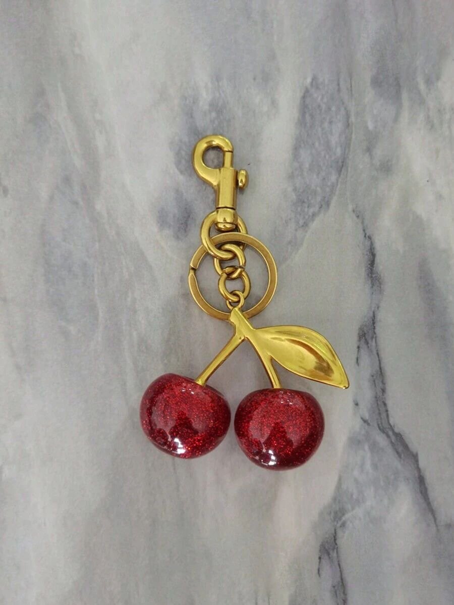 Porte-clés cerises Coach