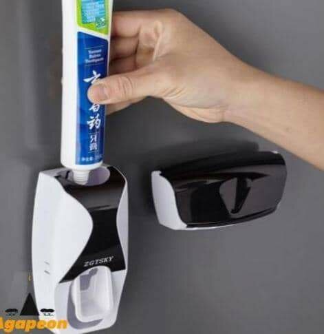 Toothbrushes + toothpaste dispenser