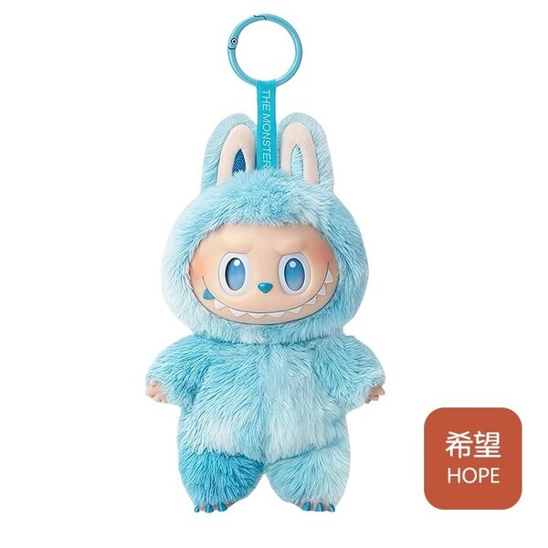 Pendentif poupée en peluche de