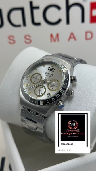 Montre de luxe Swatch authentique avec sa boîte