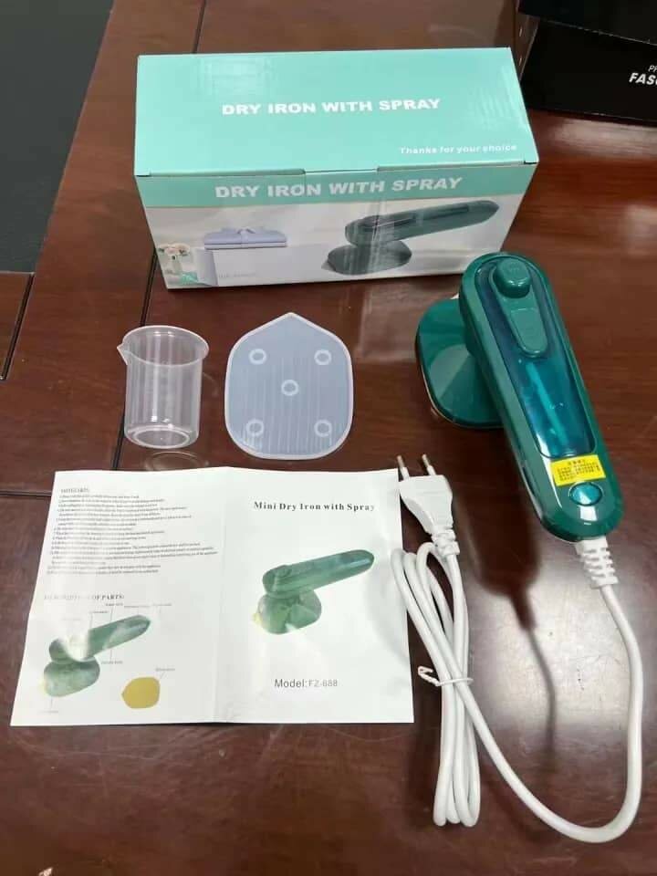 Fer à repasser portable avec vaporisateur