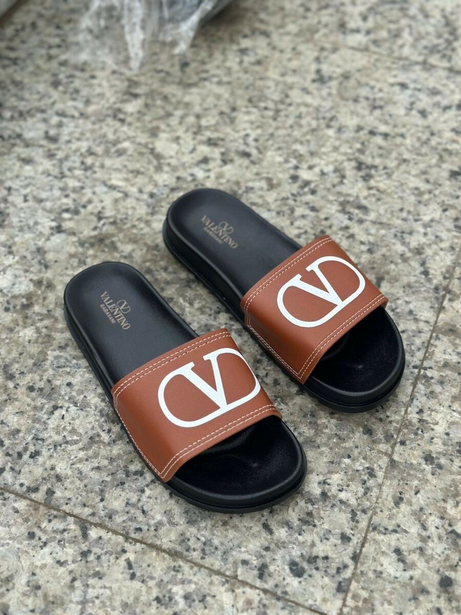 Claquettes élégantes en cuir