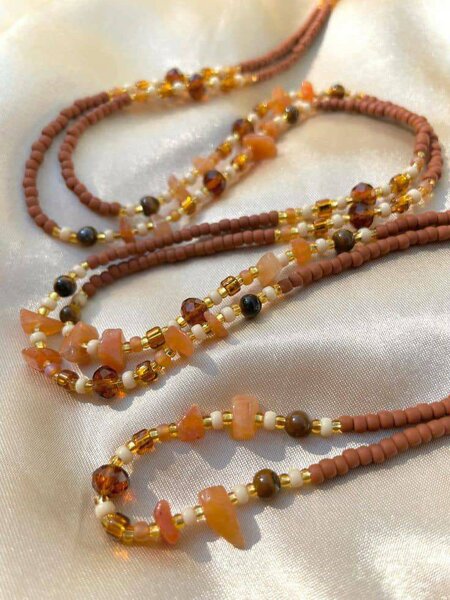 Collier en perles au rien doré