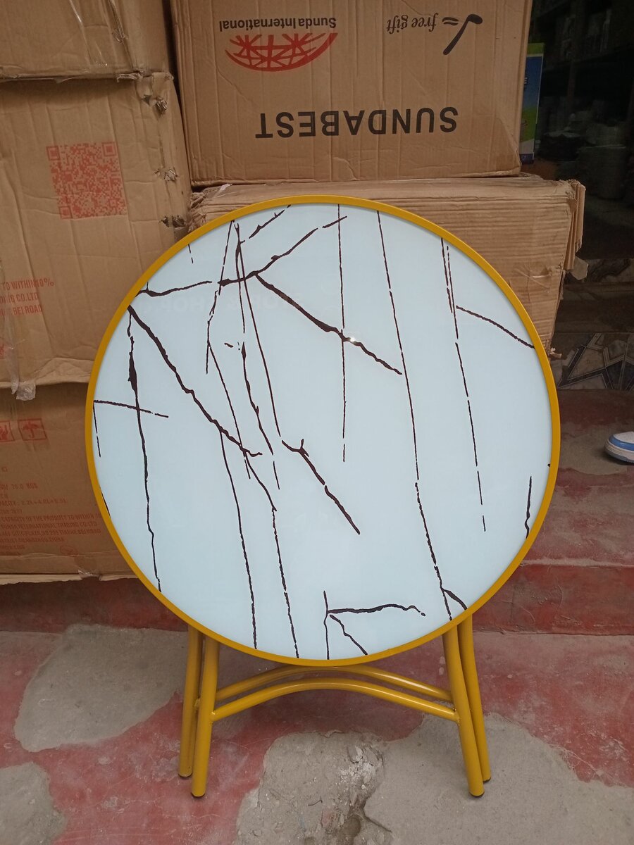 Table ronde en vitrée