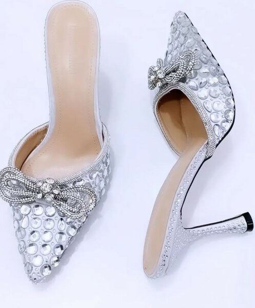 Silver sandals with large rhinestones