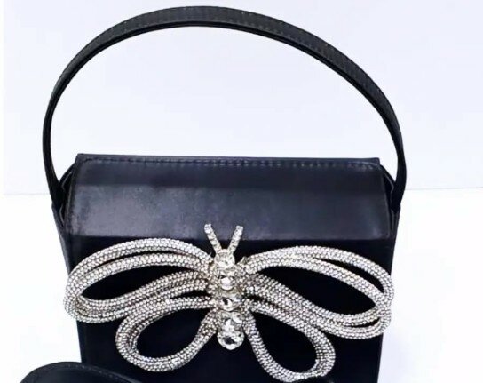 Black handbag, butterfly made of rhinestones