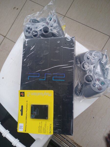 Ps2 fat+2manettes 27 jeux