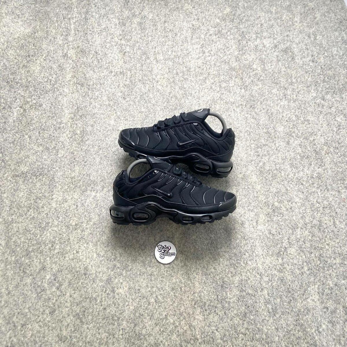 Baskets noires Nike tn enfants