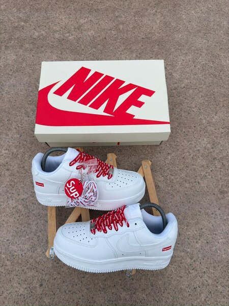 Nike Supreme White Sneakers