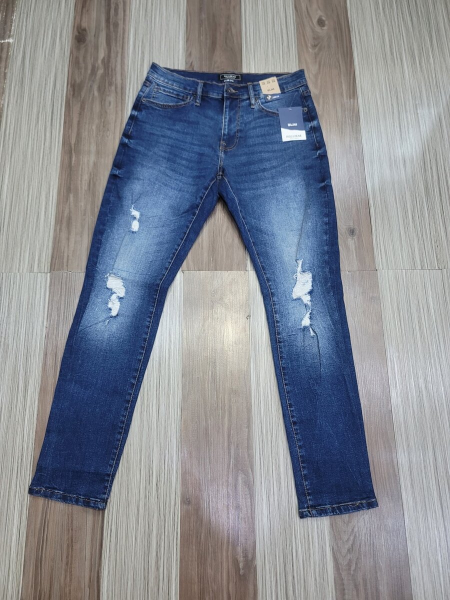 Stylish jeans with blue shade ripped