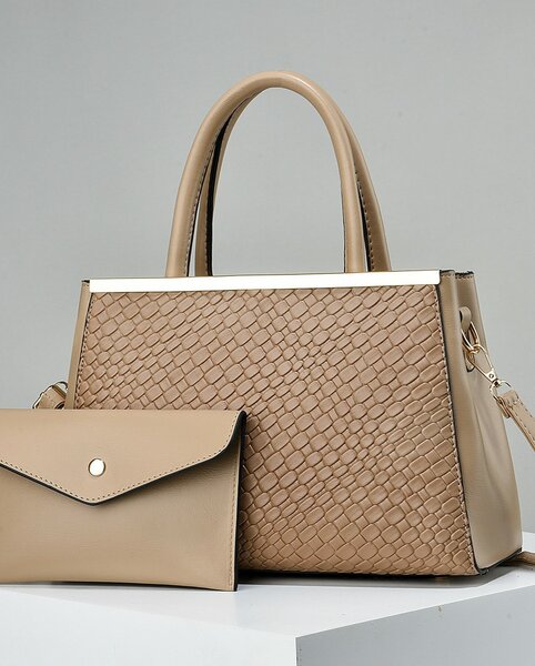 High-quality, stylish women's beige bag with an accessory
