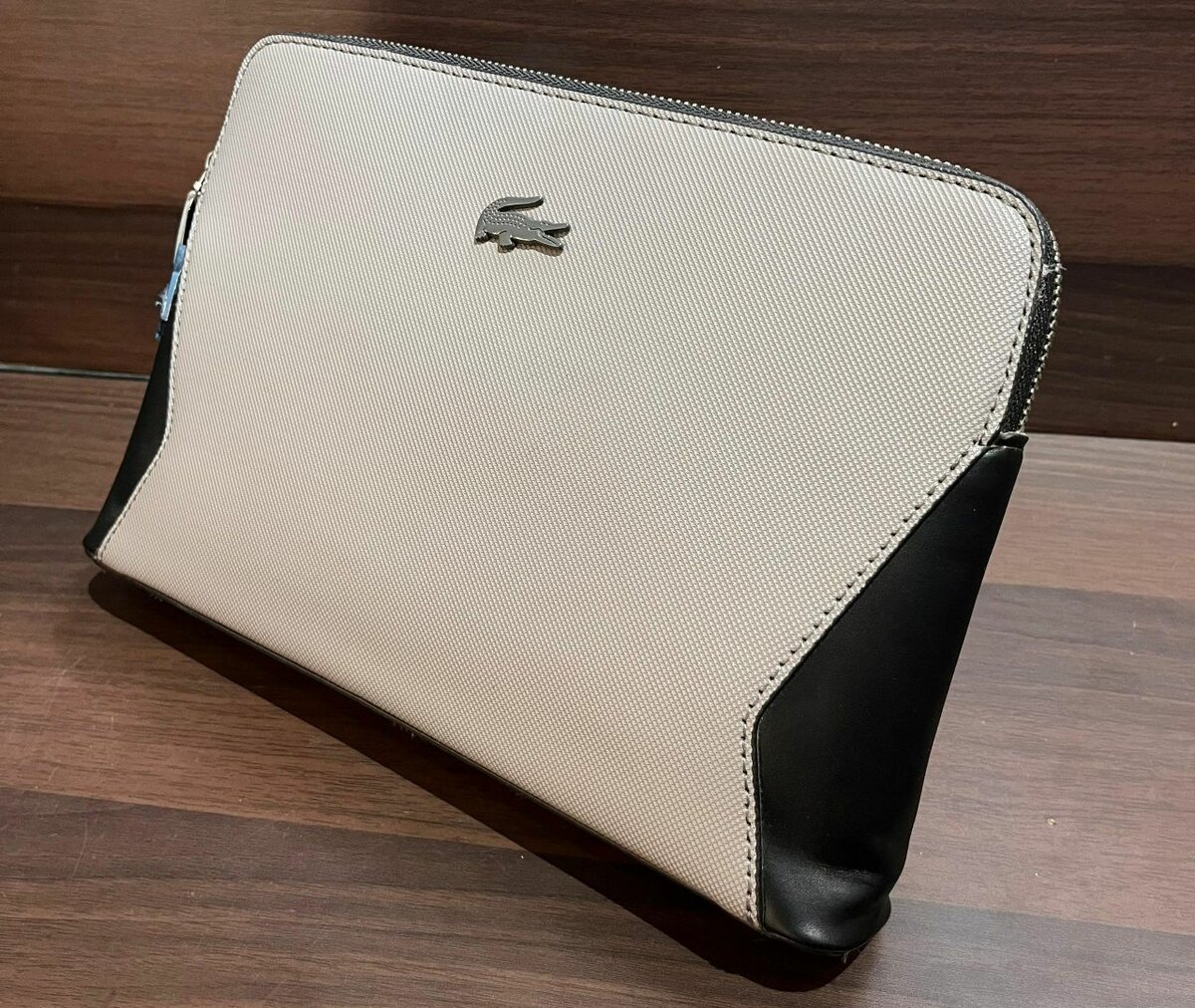 Lacoste leather pouches