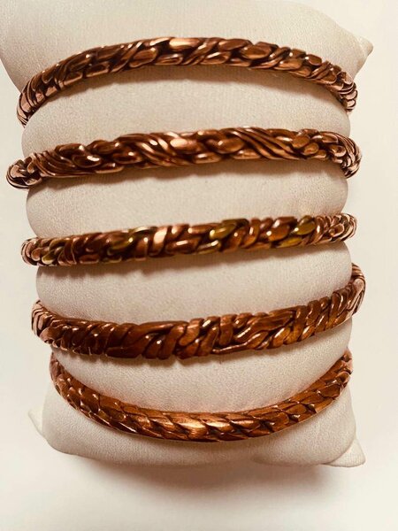 AFRICAN COPPER AND BRASS BRACELETS.