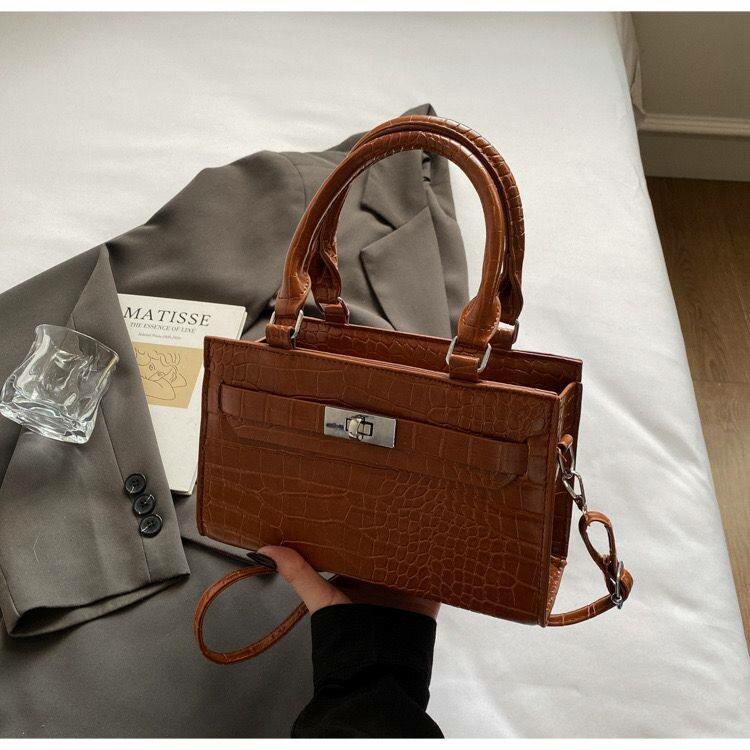 Sac à main élégant crocodile