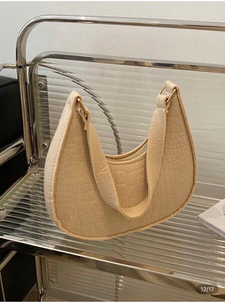 Sac à main croco élégant