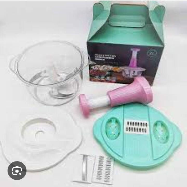 Hand pushing vegetable grater