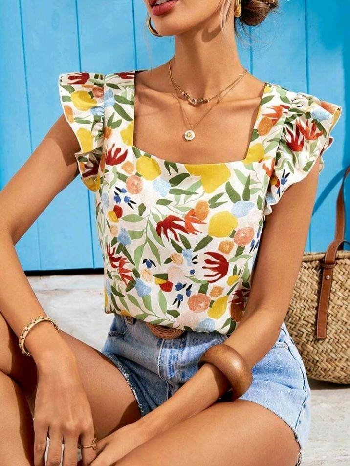 Top fleuri à manches volantes