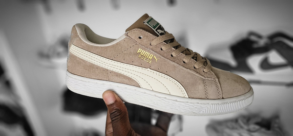 beige puma sneakers