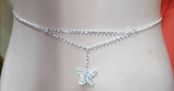 Chic chaîne au rein et au pieds papillon en argent