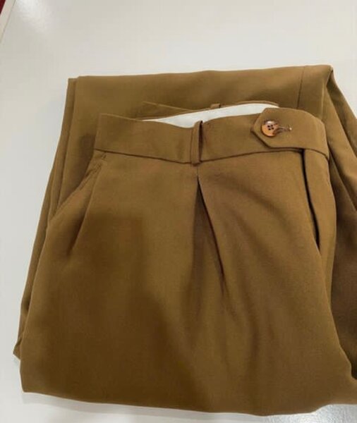 Khaki and material trousers available