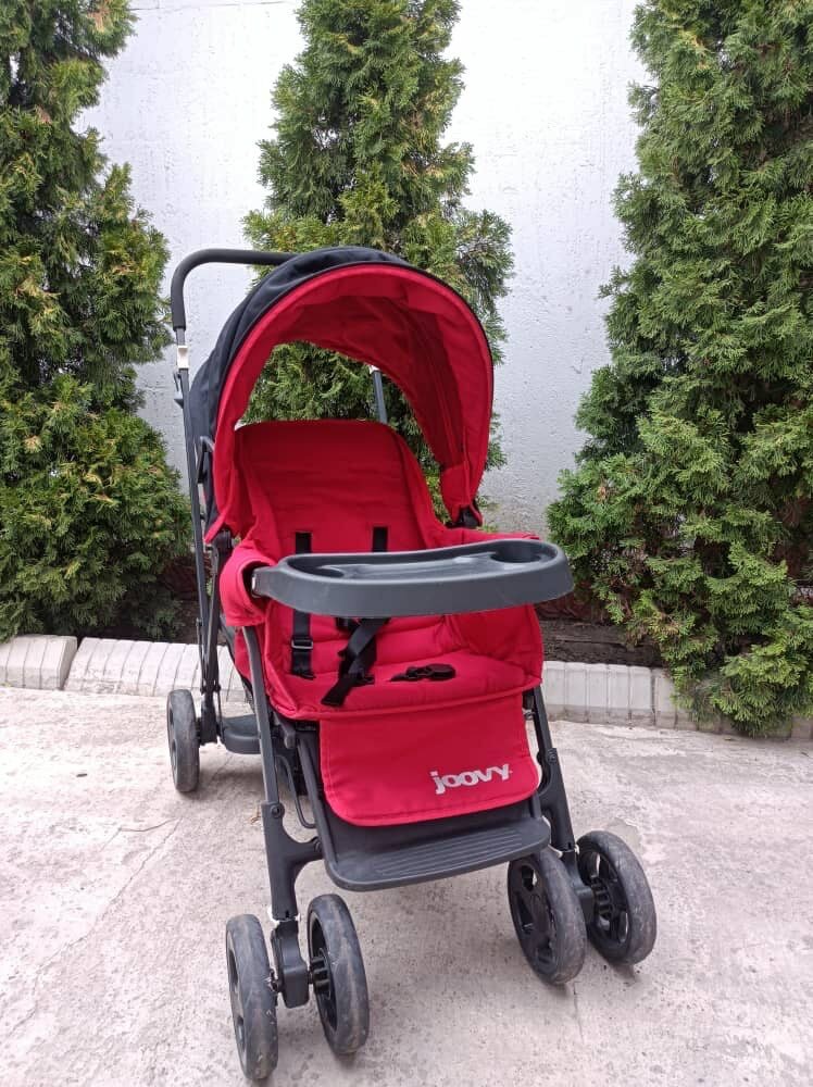 Коляска для погодок