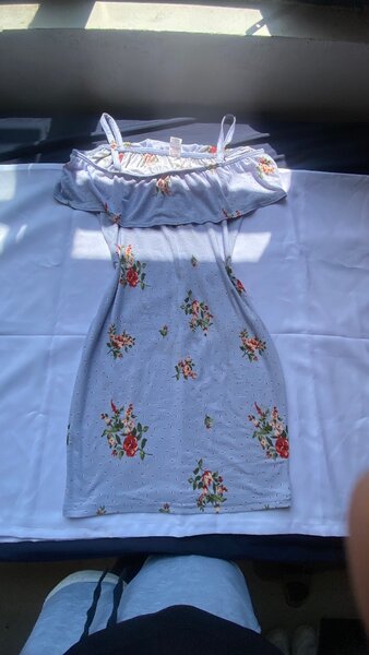 Red shirt, blue floral dress, blue tie and dye shirt